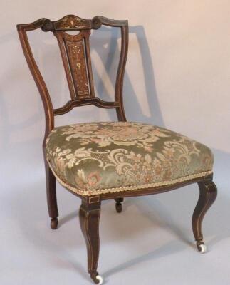 An Edwardian mahogany and boxwood strung salon chair