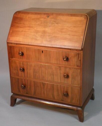 A mid-20thC walnut finish bureau