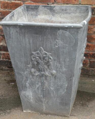 A large metal garden planter