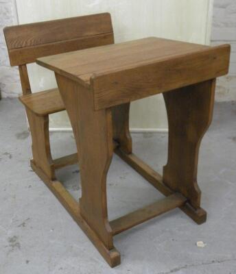 A 20thC light wood school desk