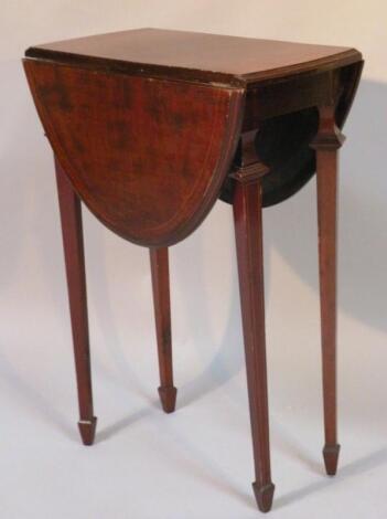 An early 20thC mahogany and boxwood strung dropleaf occasional table