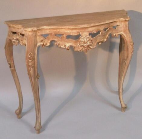 A lightwood baroque design console table