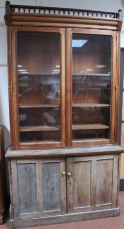 A late 19thC oak bookcase top