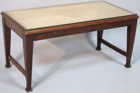 A 20thC bergere coffee table