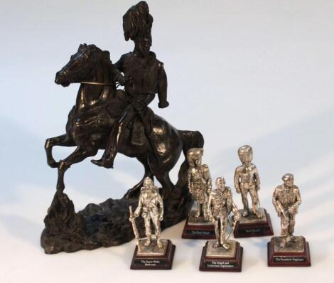 A 20thC Heredities resin figure group