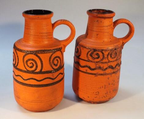 A pair of 1960's West German earthenware ewers