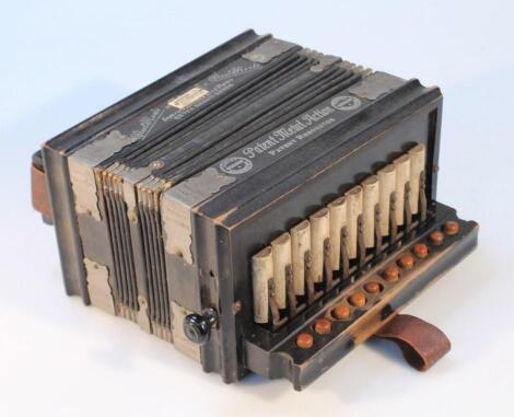 An early 20thC Triumph squeeze box accordion