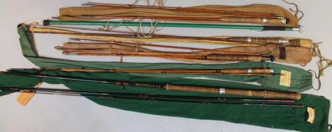 A quantity of various split cane fishing rods