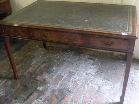 A 20thC mahogany library table