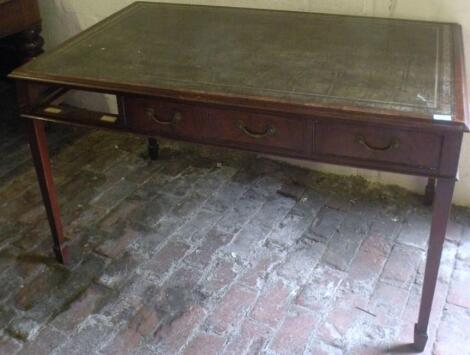 A 20thC mahogany library table