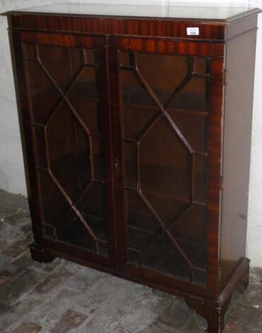 A 20thC mahogany finish bookcase