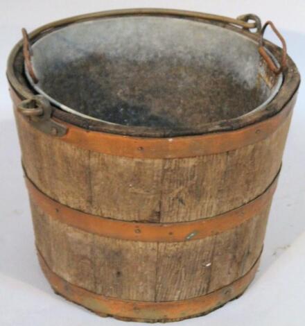 A 20thC oak coopered bucket