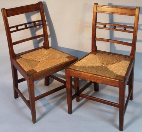 A pair of late 18thC/early 19thC elm country chairs