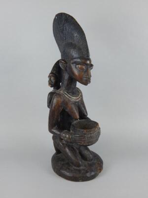 Tribal Art. An African carved wooden figure