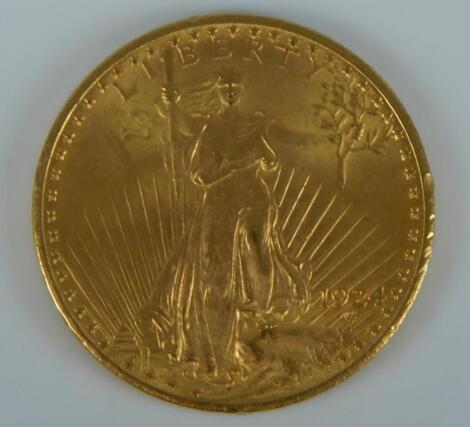 A 1924 American gold twenty dollar coin.