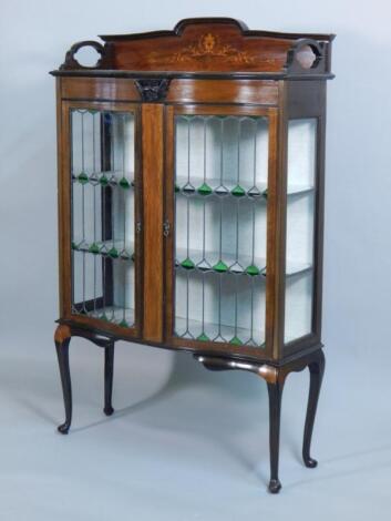 An Edwardian mahogany and marquetry display cabinet