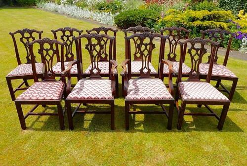 A set of ten Chippendale style mahogany dining chairs