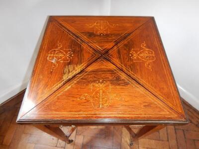 An Edwardian inlaid rosewood envelope top card table - 2