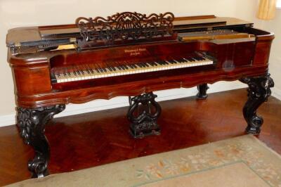 A late 19thC table piano by Steinway and Sons of New York