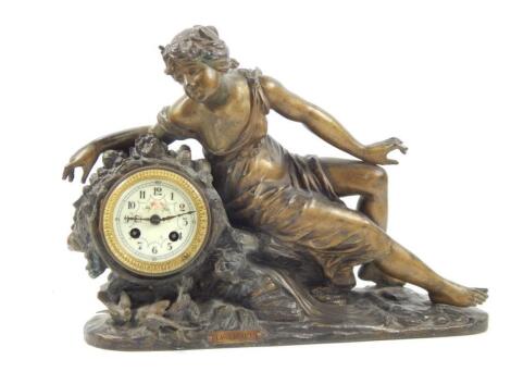 An early 20thC Continental reclining spelter figural mantel clock