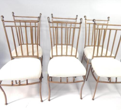 A set of six cast upholstered dining chairs