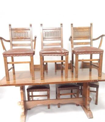 An oak refectory style table and set of six oak lime washed style dining chairs
