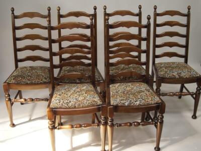 A reproduction oak gateleg table and six ladderback chairs. - 2