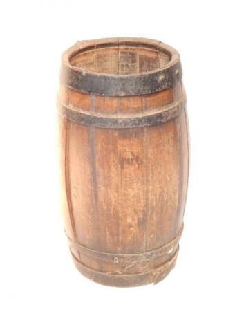 A coopered barrel fashioned into a stick stand