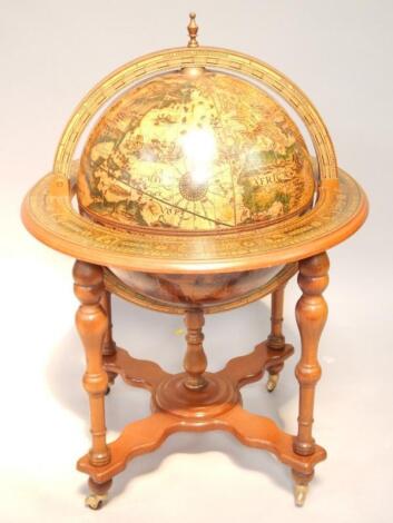 A mahogany drinks globe