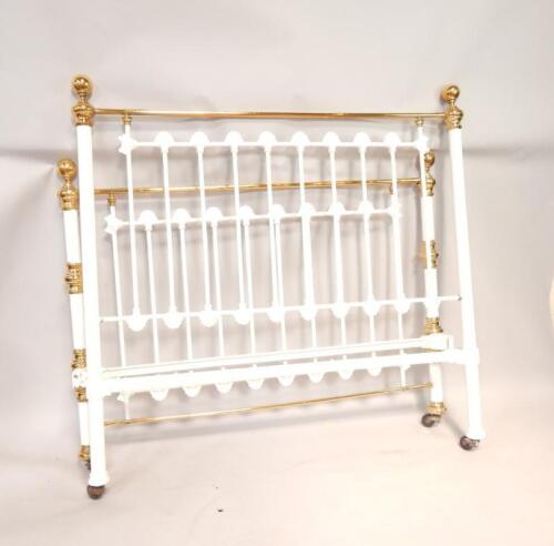 A Victorian painted cast and brass bedstead