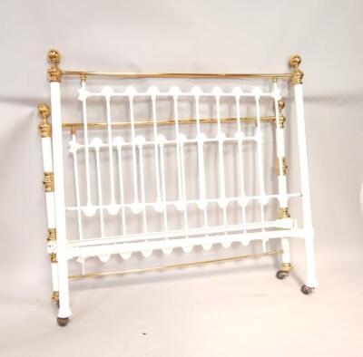 A Victorian painted cast and brass bedstead