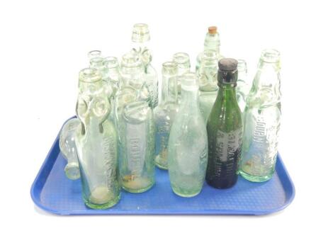 A collection of Lee and Green of Bourne Sleaford and Spalding glass bottles