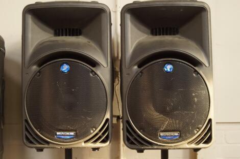 A pair of Mackie SRM 450 active sound reinforcement monitor system top speakers