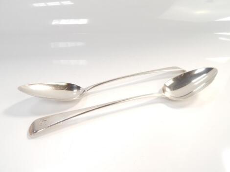 A pair of Georgian silver stuffing spoons