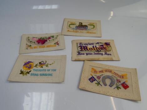 Five WWI period silk postcards.