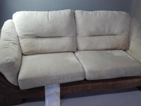 A leatherette finish three seater sofa