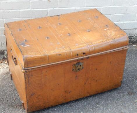 A mid 20thC tin shipping trunk