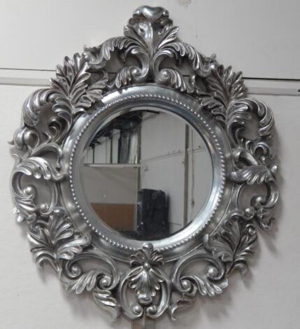 A moulded chrome effect rococo style mirror