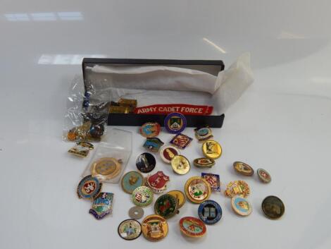 A collection of bowling club pin badges