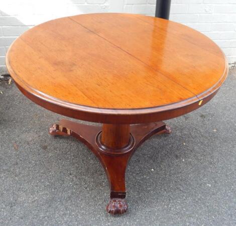 A Victorian plum-pudding mahogany tilt top breakfast table