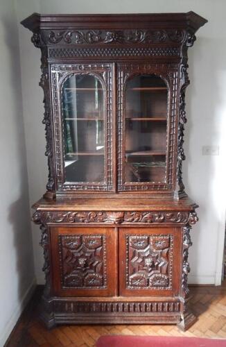 A Victorian carved oak bookcase