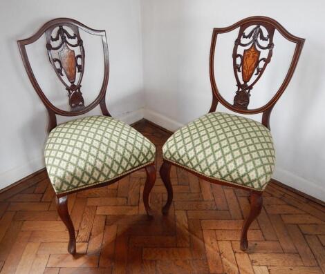A pair of late Victorian inlaid mahogany single chairs