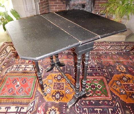 A Victorian ebonised Sutherland table