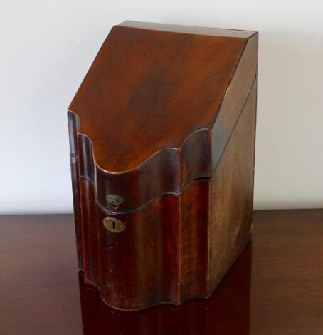 A George III mahogany serpentine knife box