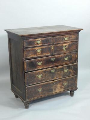 A mid 18thC walnut and oak chest of drawers