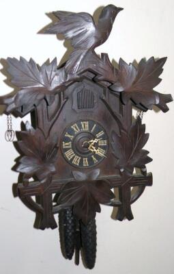 An early 20thC German Black Forest cuckoo clock.