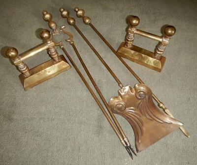 A set of three brass fire implements of Edwardian design