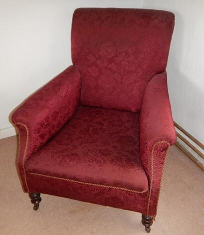 A late Victorian upholstered armchair