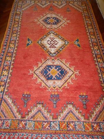 A Moroccan bordered rug