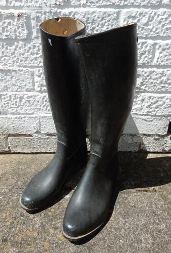 A pair of ladies rubber riding boots.